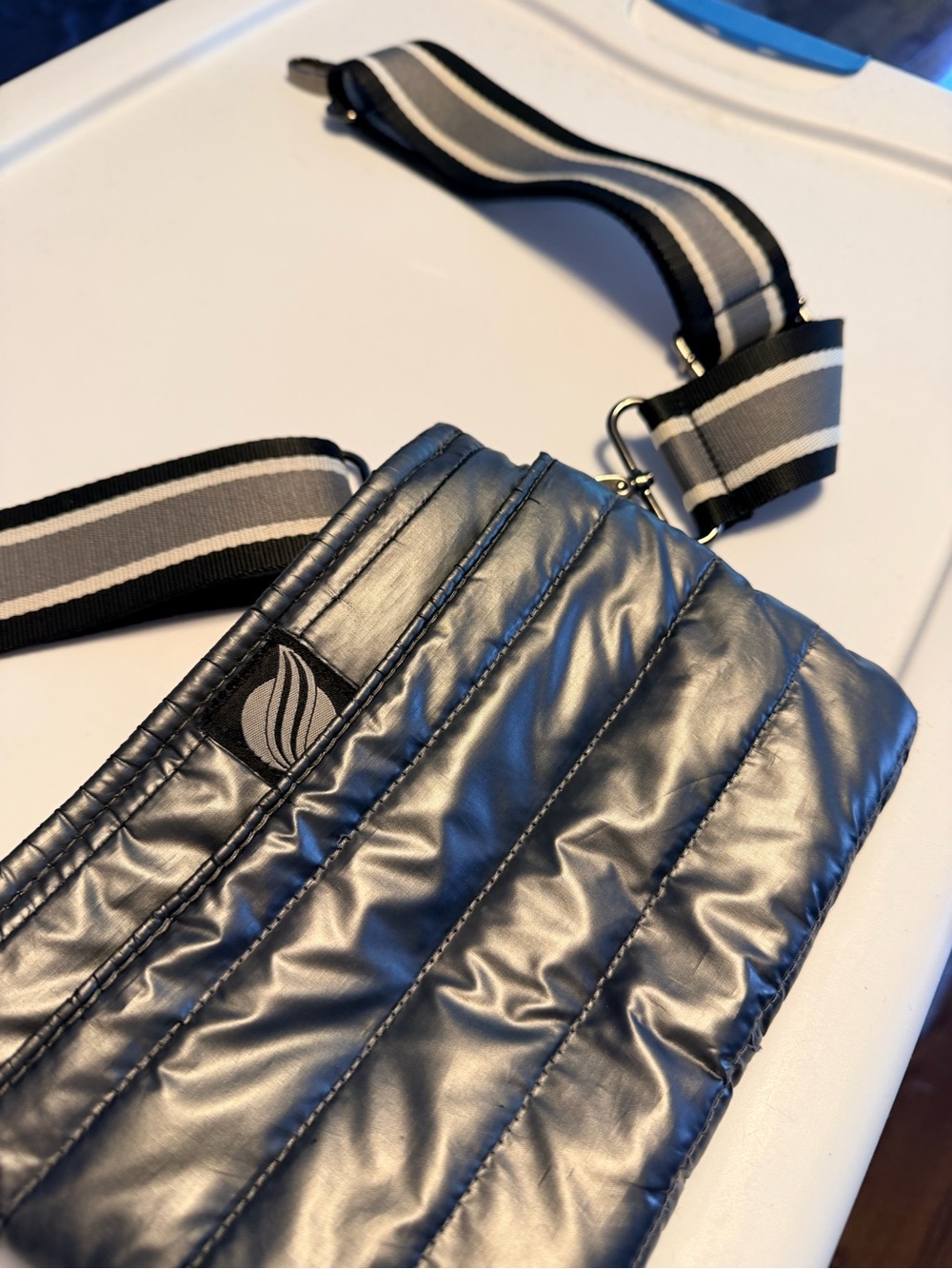 Think Royln Quilted Crossbody Bag in Metallic Gray